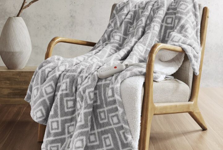 Amira Dream Soft Heated Throw in Grey Geo From Sharper Image