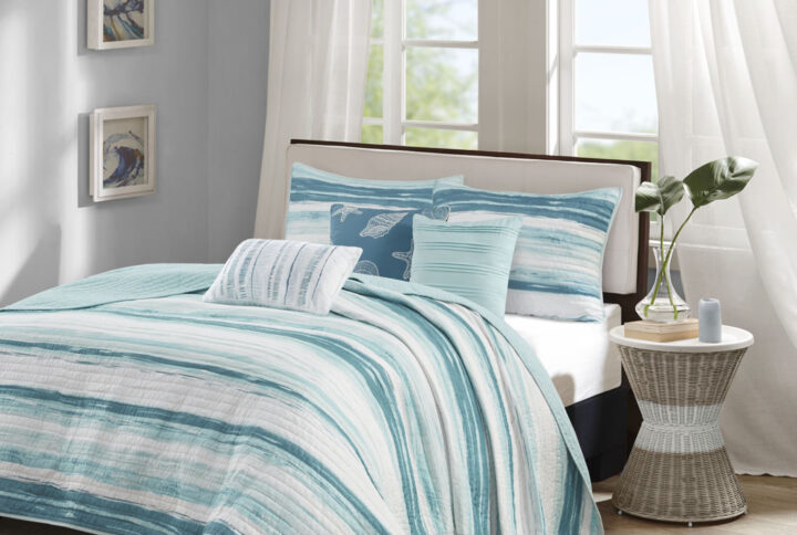 Marina 6 Piece Printed Quilt Set with Throw Pillows in Aqua From Madison Park