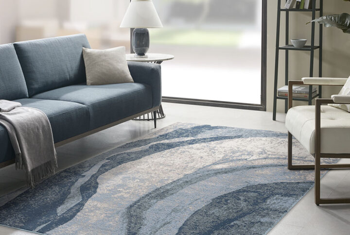 Grace Abstract Wave Area Rug in Blue From Madison Park