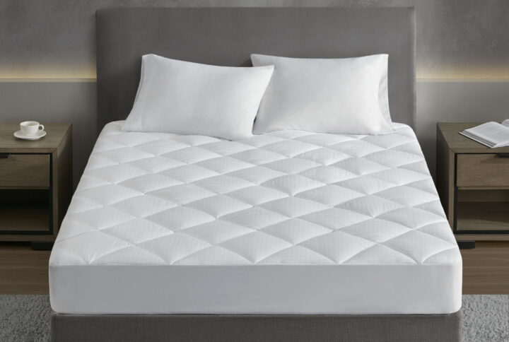 Signature Dobby Cotton Waterproof Mattress Pad in White From Croscill