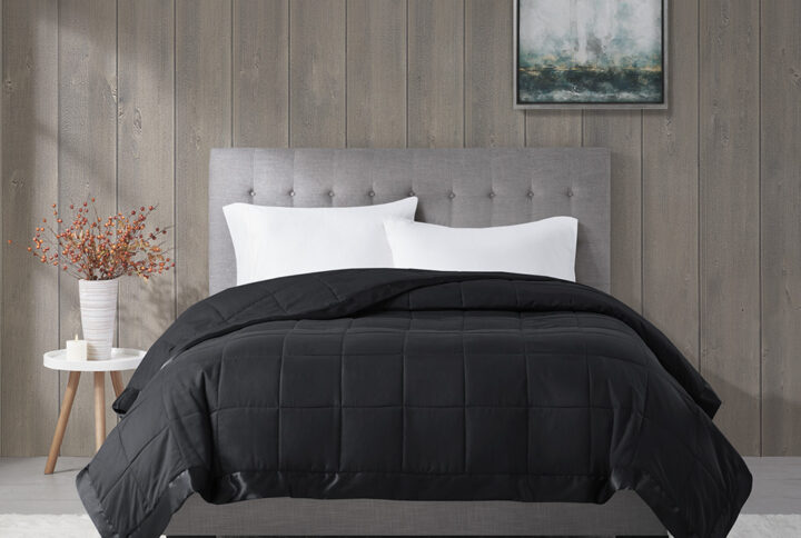 Windom Lightweight Down Alternative Blanket with Satin Trim in Black From Madison Park