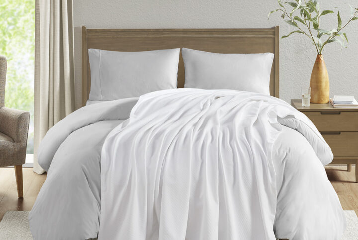 Liquid Cotton Blanket in White From Madison Park