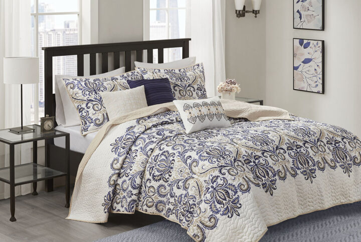 Cali 6 Piece Reversible Quilt Set with Throw Pillows in Navy/Tan From Madison Park