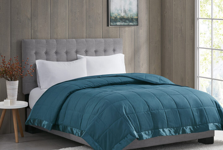 Windom Lightweight Down Alternative Blanket with Satin Trim in Teal From Madison Park