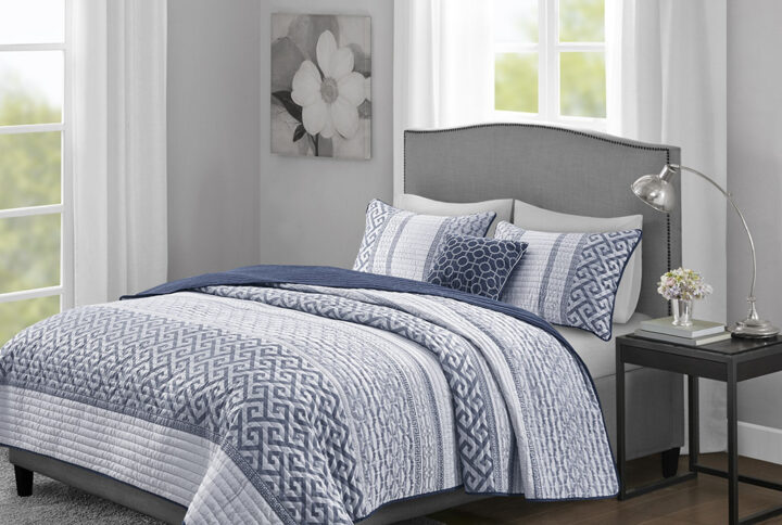 Bennett 4 Piece Jacquard Quilt Set with Throw Pillow in Navy From Madison Park