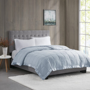 Windom Lightweight Down Alternative Blanket with Satin Trim in Blue From Madison Park