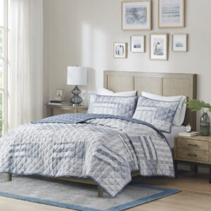 Graham 3 Piece Jacquard Patchwork Quilt Set in Blue From Madison Park