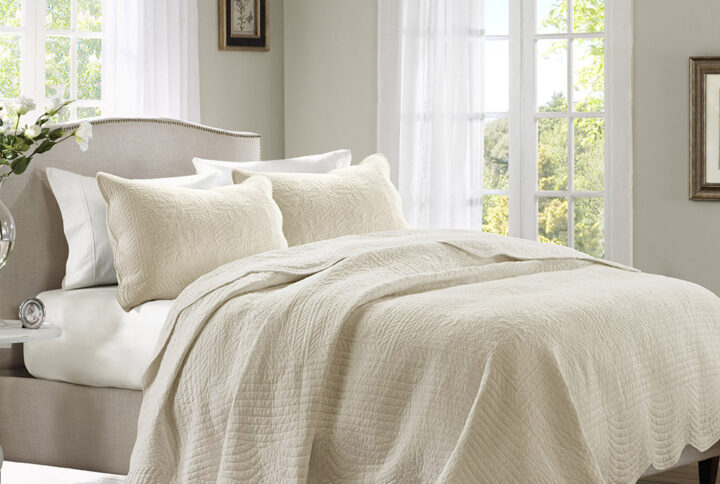 Tuscany 3 Piece Reversible Scalloped Edge Quilt Set in Cream From Madison Park