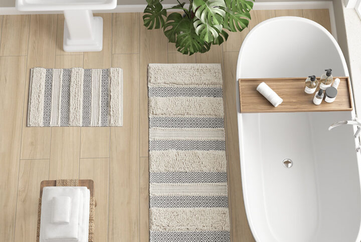 Asher Woven Texture Stripe Bath Rug in Grey From INK+IVY