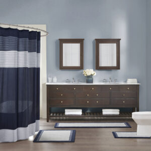 Amherst Cotton Tufted Bath Rug in Navy From Madison Park