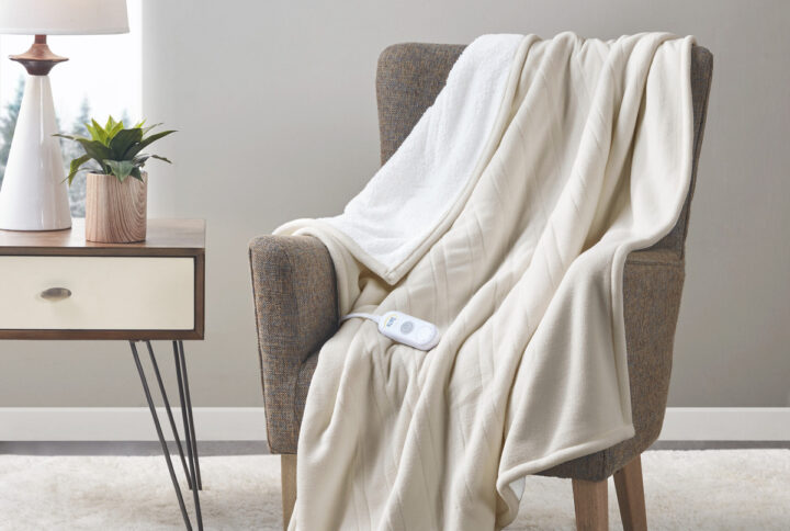 Fleece to Sherpa Heated Throw in Tan From Serta