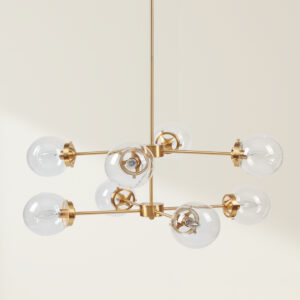 Calista 8-Light Metal Chandelier with Globe Bulbs in Gold/Clear From INK+IVY