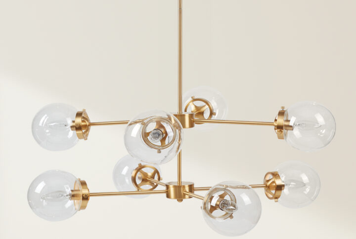 Calista 8-Light Metal Chandelier with Globe Bulbs in Gold/Clear From INK+IVY