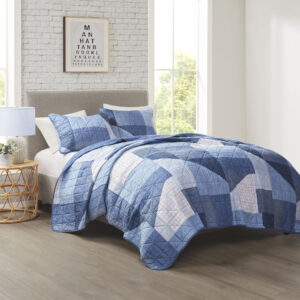 Skyler Patchwork Printed Reversible Quilt Set in Blue From Intelligent Design