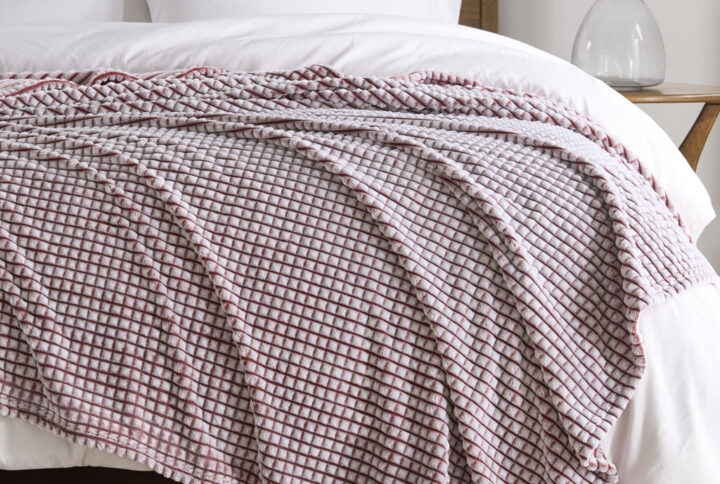 Carved Plush Blanket in Red From Madison Park