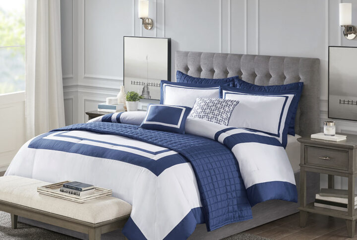 Heritage 8 Piece Comforter and Quilt Set Collection in Navy From Madison Park