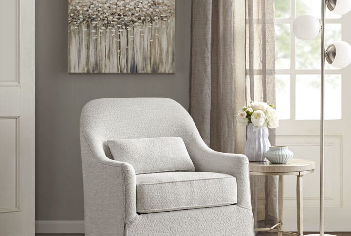 Theo Swivel Glider Chair in Ivory/Black From Madison Park