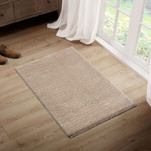 Camdyn Super Soft Polyester Shag Area Rug in Cream From Madison Park