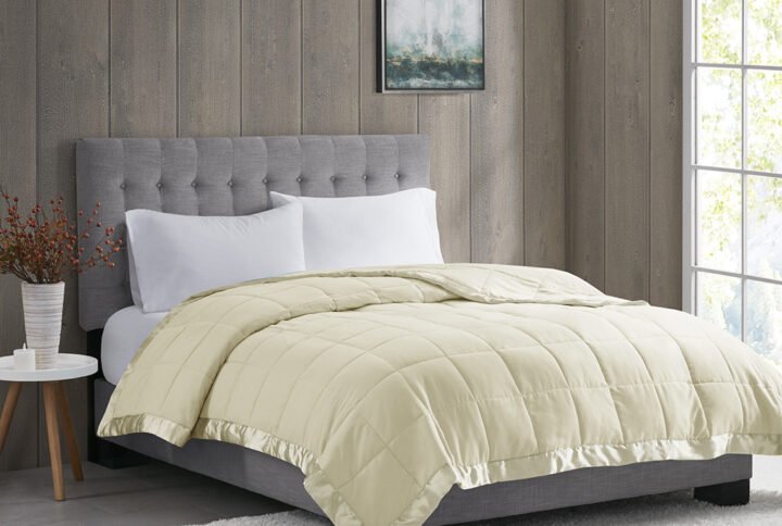 Windom Lightweight Down Alternative Blanket with Satin Trim in Cream From Madison Park