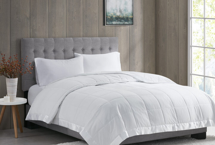 Windom Lightweight Down Alternative Blanket with Satin Trim in White From Madison Park