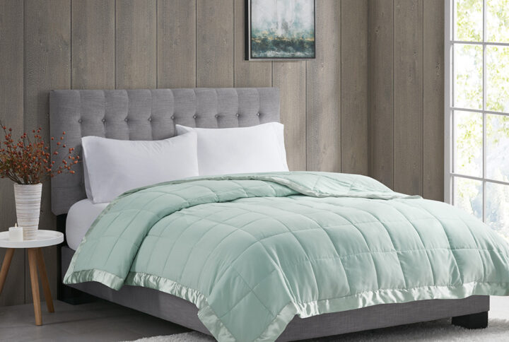 Windom Lightweight Down Alternative Blanket with Satin Trim in Seafoam From Madison Park