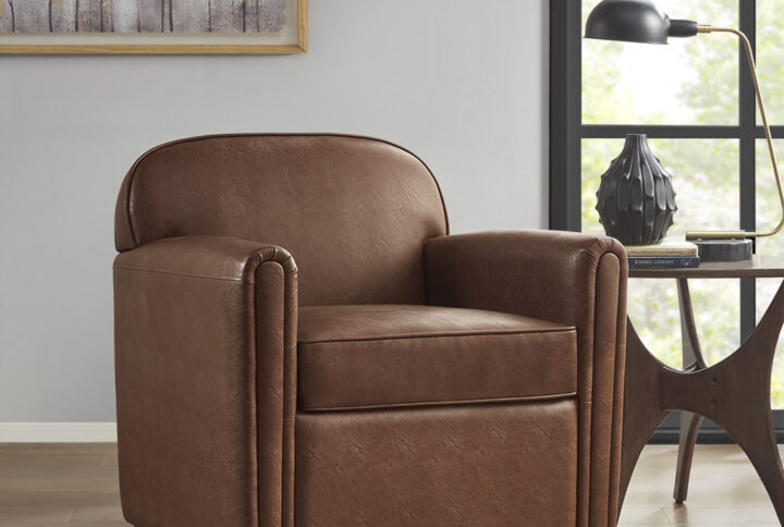 Archer Faux Leather 360 Degree Swivel Arm Chair in Brown From Madison Park