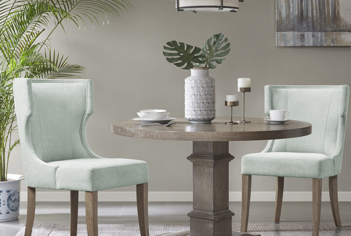 Carson Upholstered Wingback Dining Chair in Light Sage Green From Madison Park