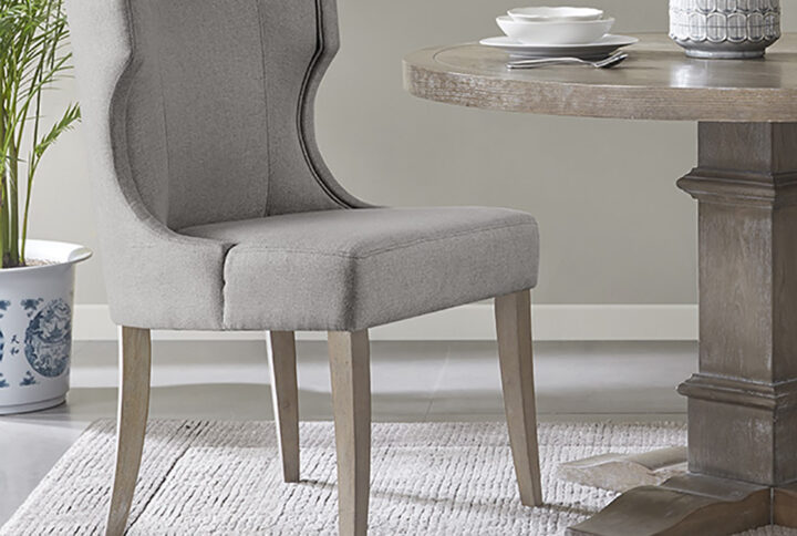 Carson Upholstered Wingback Dining Chair in Light Grey From Madison Park