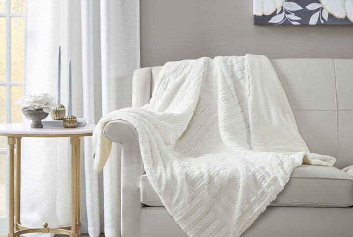 Arctic Ultra Plush Down Alternative Throw in Ivory From Madison Park