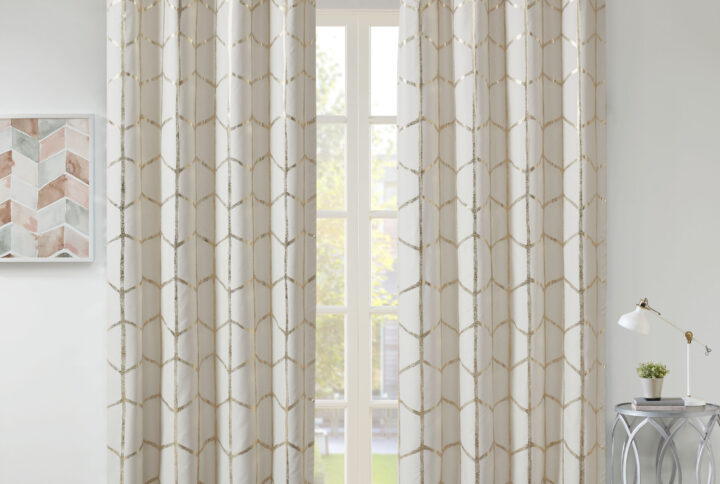 Raina Total Blackout Metallic Print Grommet Top Curtain Panel Pair in Ivory/Gold From Intelligent Design