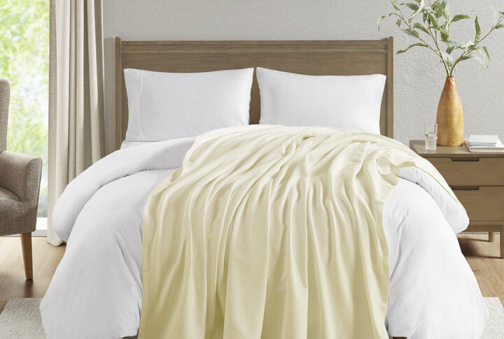 Liquid Cotton Blanket in Ivory From Madison Park