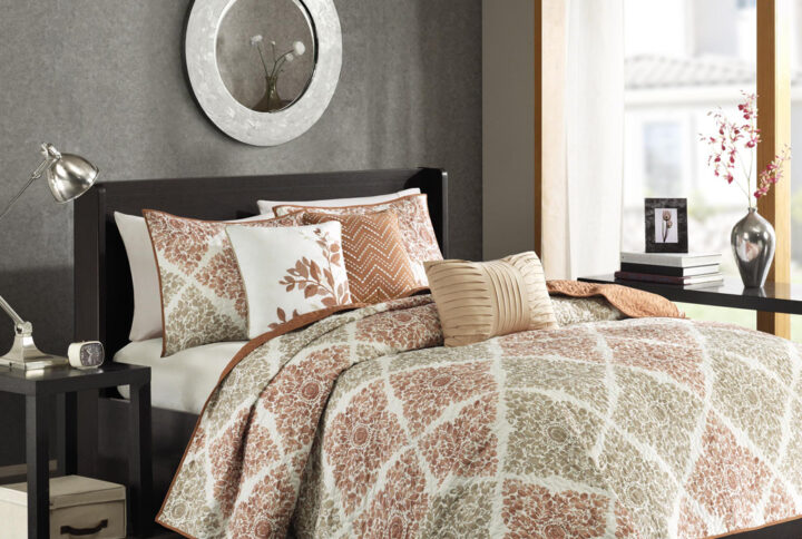 Claire 6 Piece Printed Quilt Set with Throw Pillows in Multi From Madison Park