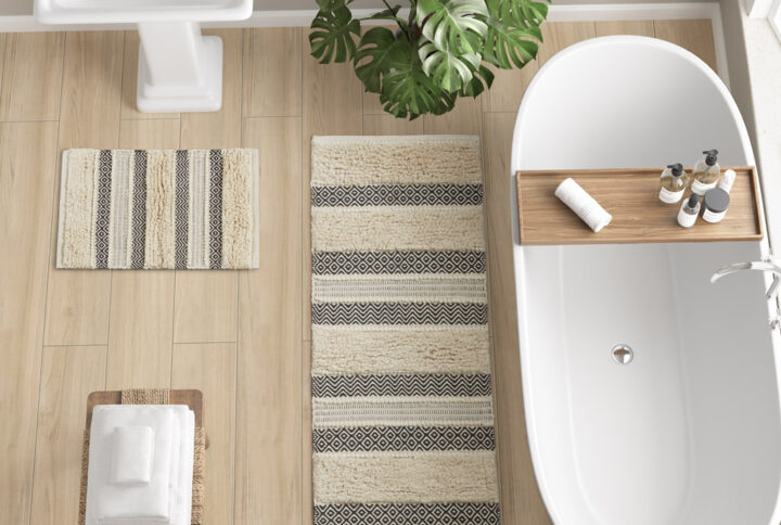 Asher Woven Texture Stripe Bath Rug in Black From INK+IVY