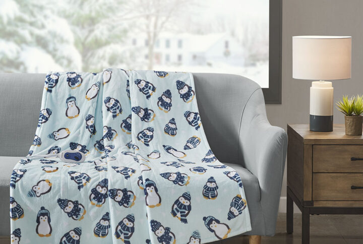 Oversized Plush Printed Heated Throw in Aqua Penguins From Beautyrest