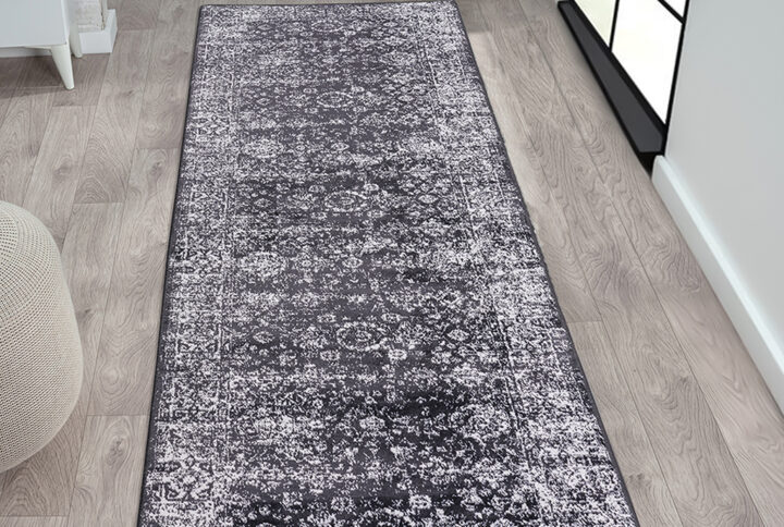 Chadwick Distressed Vintage Persian Woven Area Rug in Black/Cream From Madison Park