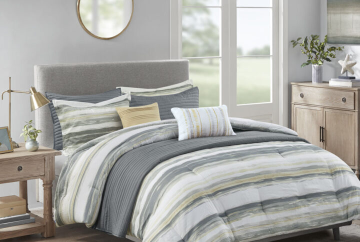 Marina 8 Piece Printed Seersucker Comforter and Quilt Set Collection in Yellow From Madison Park