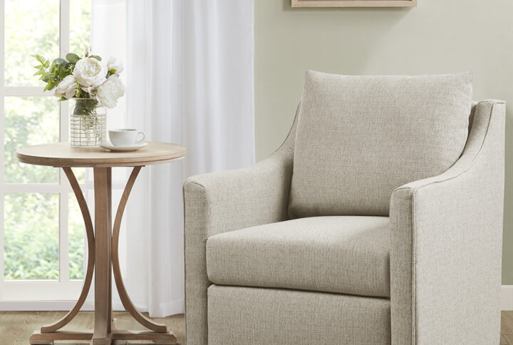 Christian Swivel Armchair in Natural From Martha Stewart