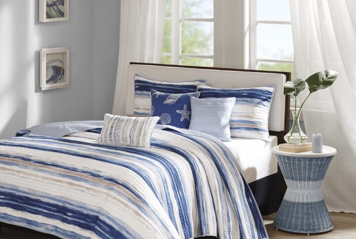 Marina 6 Piece Printed Quilt Set with Throw Pillows in Blue From Madison Park