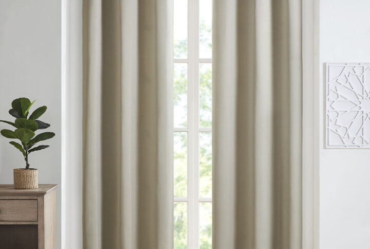 Taren Solid Blackout Triple Weave Grommet Top Curtain Panel Pair in Beige From SunSmart