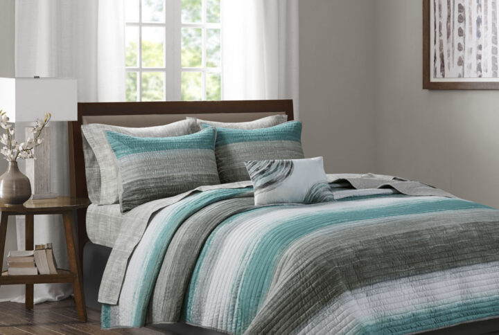 Saben 8 Piece Quilt Set with Cotton Bed Sheets in Aqua From Madison Park Essentials