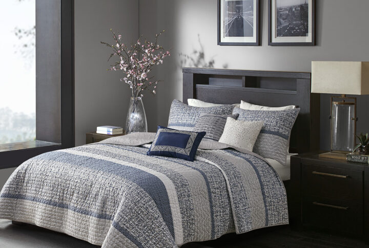 Rhapsody 6 Piece Reversible Jacquard Quilt Set with Throw Pillows in Navy From Madison Park