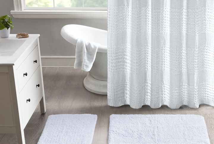 Ritzy 100% Cotton Solid Tufted 2 Piece Bath Rug Set in White From Madison Park Signature