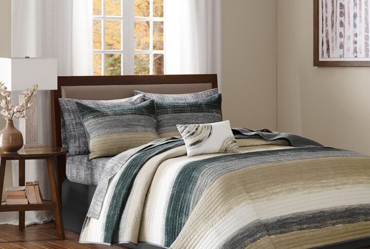 Saben 8 Piece Quilt Set with Cotton Bed Sheets in Taupe From Madison Park Essentials