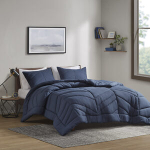 Remy Quilted Chevron Comforter Set in Navy From Intelligent Design