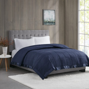 Windom Lightweight Down Alternative Blanket with Satin Trim in Navy From Madison Park