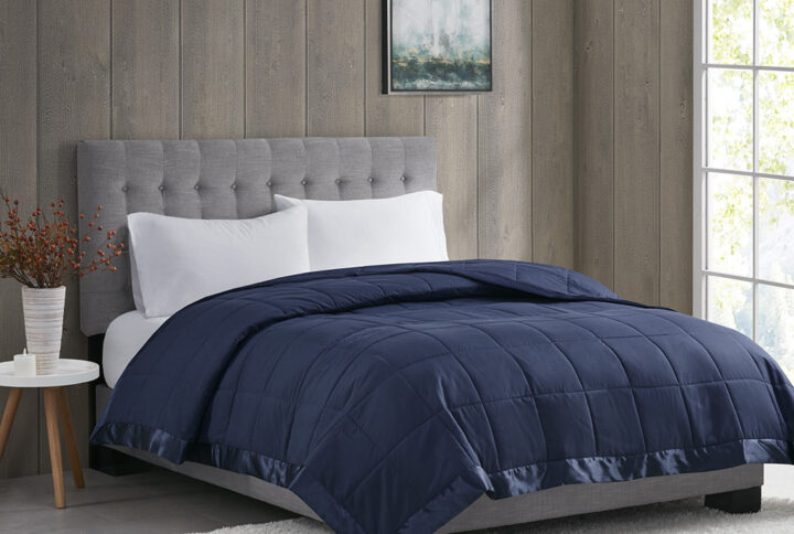 Windom Lightweight Down Alternative Blanket with Satin Trim in Navy From Madison Park