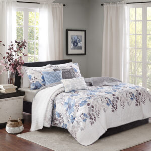 Luna 6 Piece Printed Quilt Set with Throw Pillows in Blue From Madison Park