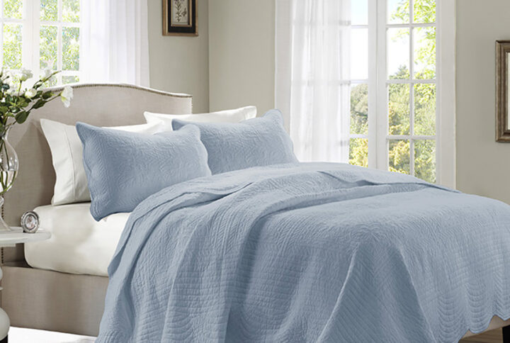 Tuscany 3 Piece Reversible Scalloped Edge Quilt Set in Blue From Madison Park