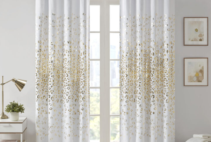 Lillie Grommet Top Metallic Animal Printed Total Blackout Curtain in White/Gold From Intelligent Design