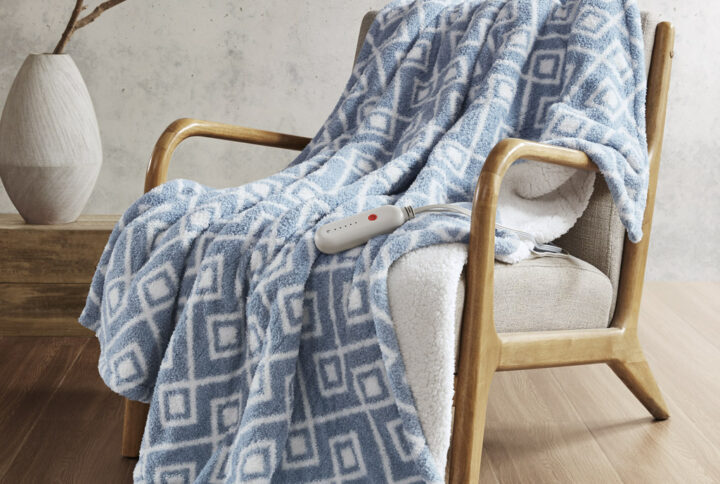 Amira Dream Soft Heated Throw in Blue Geo From Sharper Image